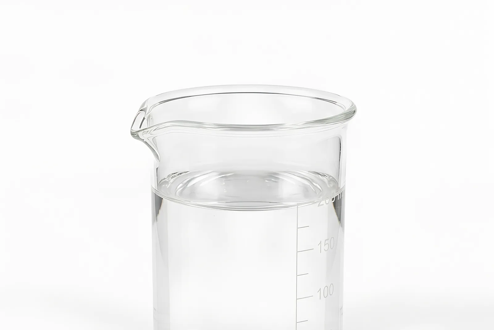 Clear liquid paraffin white mineral oil BHD Chemical sample in a glass laboratory beaker on a white background.